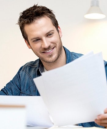 man with paper