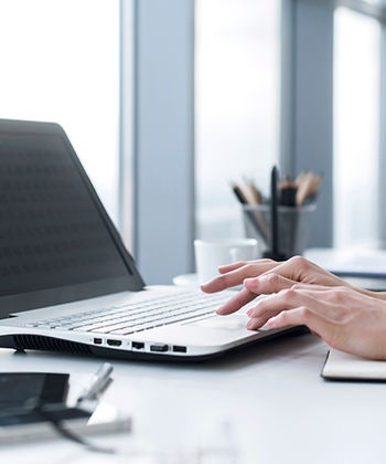 laptop and hands