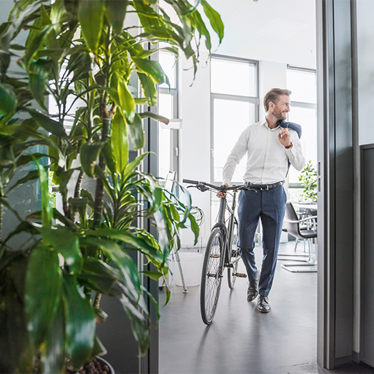 close up of hands working on a laptop