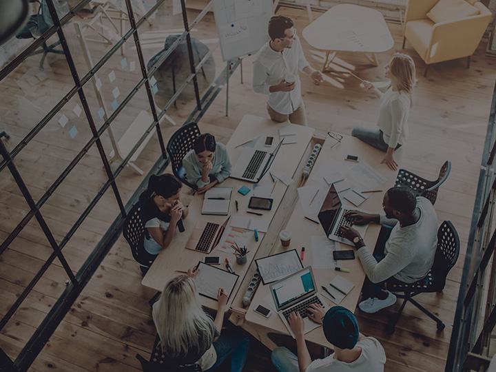 Unsere Philosophie overhead office shot