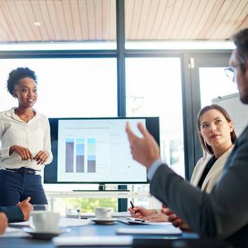 group of colleagues in meeting
