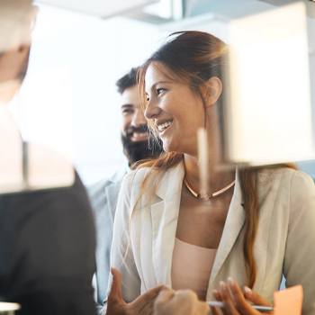 Kyocera Gruppe woman smiling in meeting